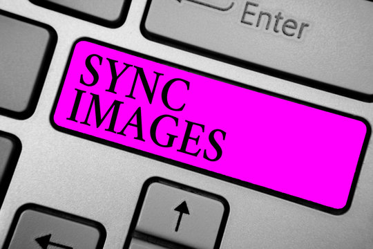 Conceptual hand writing showing Sync Images. Business photo text Making photos identical in all devices Accessible anywhere Keyboard purple key computer computing reflection document
