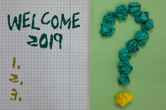 Text sign showing Welcome 2019. Conceptual photo New Year Celebration Motivation to Start Cheers Congratulations Notebook paper crumpled papers forming question mark green background