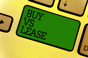 Conceptual hand writing showing Buy Vs Lease. Business photo text Own something versus borrow it...