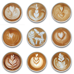 Collection of mugs of latte art coffee isolted on white background.