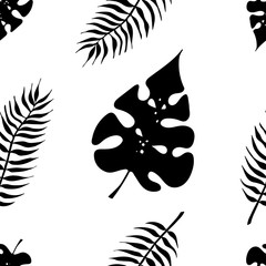 tropical seamless of leaves silhouettes Monstera and palm