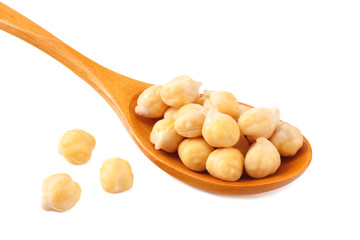 chickpeas in wooden spoon isolated on white background