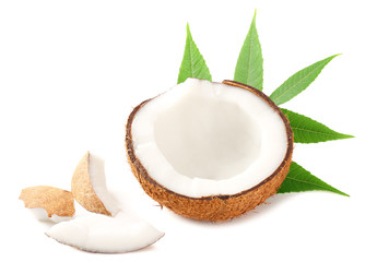 half of coconut with green leaves isolated on white background
