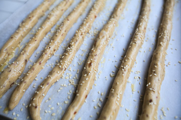 Unbaked homemade bread spelt sticks