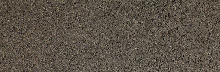 The texture of Asphalt surface. Detailed texture of the bitumen close-up. Screen short. Road foundation, background