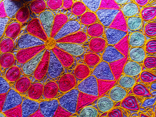 Background cloth batik Stylized flowers pattern colorful of Fabrics in Indian Style.