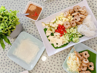 Vietnamese Meatball Wraps (Nam Neung) Food set and vegetables in vietnamese restaurant