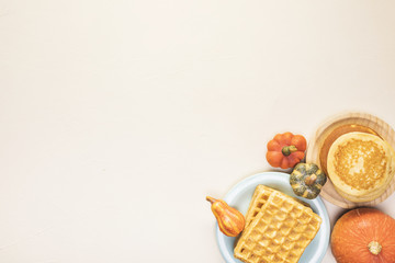 Obraz na płótnie Canvas Top view food frame with waffles