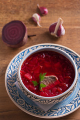 Soup borscht made with vegetables, meat, beans and beet root