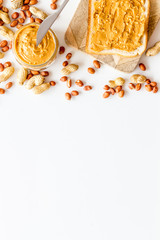 peanut butter for cooking breakfast with sandwiches at home on white background top view mock-up