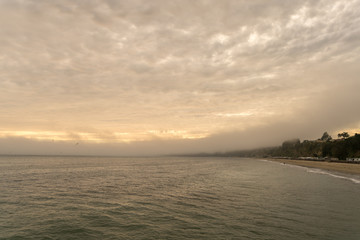 View of Dense Clouds Over West Coast Beach