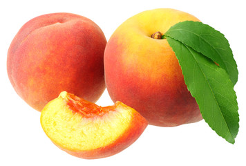 peach fruit with green leaves and slices isolated on white background