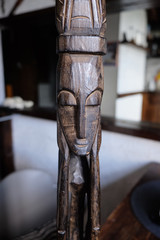 Wooden figurine of a pagan idol close up
