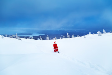 Authentic Santa Claus on a snowy mountain.