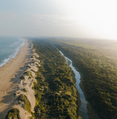 Aerial view of the beach and of sand dunes.