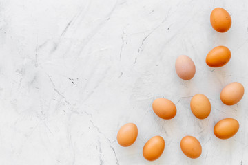 Fresh eggs for organic food on marble background top view mockup