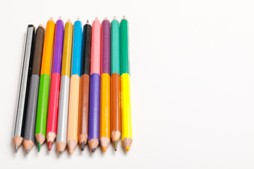 The concept of the teacher's day, School stationery, pencil, pen, note, Spectacles, tie in pen box on white background