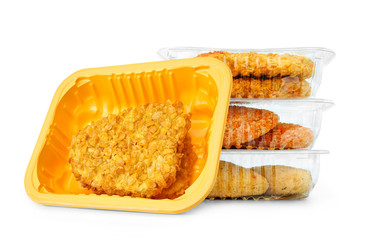 Package of chicken breast schnitzel isolated on white background.