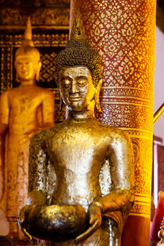 Beautiful golden Buddha Statue In the temple of Thailand