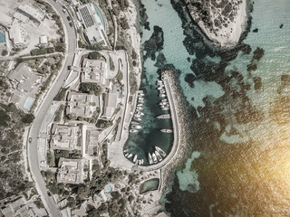 Beautiful birdeye view on the sea coastline with pier and yakhts
