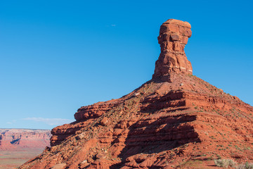 Fototapeta na wymiar Valley of the Gods in Utah low angle landscape of large vertical rock formations or buttes