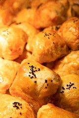 Tasty rolls with black sesame seeds. Background