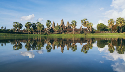 Fototapeta na wymiar Angkor Wat temple panoramic reflection in lake water at sunset, Cambodia