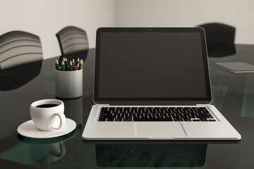 Office situation concept with black mock up laptop monitor on glass table with coffee mug.