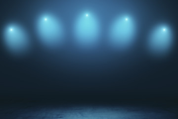 Abstract empty stage in dark hall with blurry spotlights and dark concrete floor.