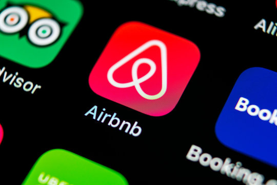 Sankt-Petersburg, Russia, May 10, 2018: Airbnb application icon on Apple iPhone X screen close-up. Airbnb app icon. Airbnb.com is online website for booking rooms. social media network.