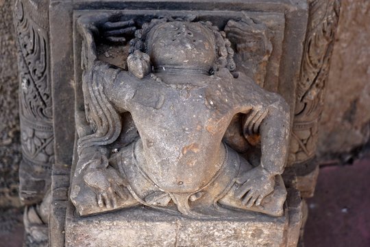 india -rajasthan - jaipur - march 28, 2018, archeological relics sculpture, yoga pose have a figure on a stone.