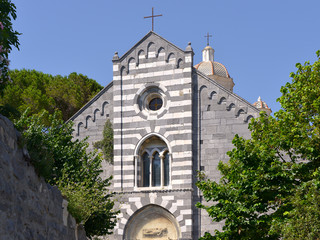 Façade of San Lorenzo church at Portovenere (or Porto Venere), is a town and commune located on...