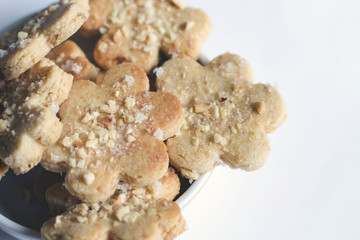 Closeup of some homemade biscuits in a bowl from above