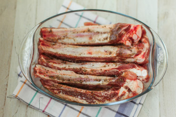 Fresh pork ribs marinated in spices. Delicious and hearty dinner.