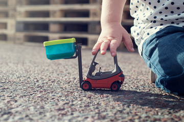 Child play with forklift
