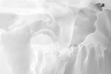 Hand painted white alcohol ink background. Abstract delicate gray texture. Contemporary wallpaper.