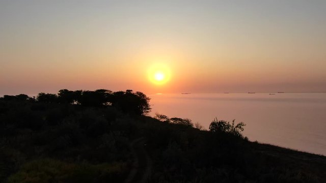 An early morning sunrise on the seasore line.