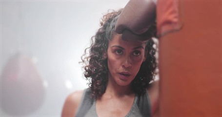 Female boxer taking a break from training