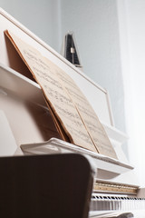 Playing Piano (shallow DOF; color toned image)