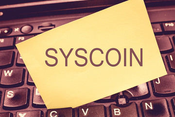 Handwriting text writing Syscoin. Concept meaning Cryptocurrency Blockchain Digital currency...