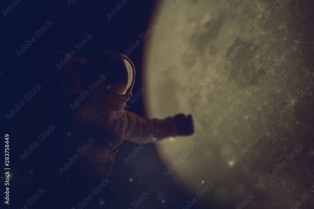 Poster Astronaut floating in space with the moon background   