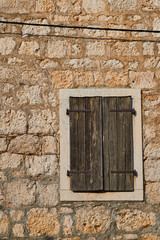 Wooden windows in a stone building