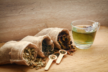 Herbal tea for health With tea bags and wooden spoons placed