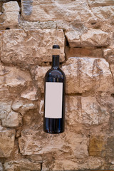 Red wine bottle on the wall