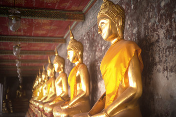 Ancient golden buddha state at Wat Suthat ,Bangkok ,Thailand