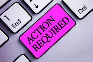 Writing note showing Action Required. Business photo showcasing Important Act Needed Immediate Quick Important Task Text two words pink insert button key press on grey computer