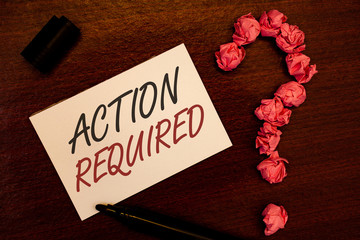 Text sign showing Action Required. Conceptual photo Important Act Needed Immediate Quick Important Task Text white paper note black marker open cap pink crumbled paper question