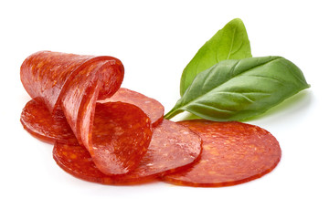 Chorizo sausage slices, Traditional spanish sausage, isolated on white background