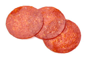 Chorizo sausage slices, Traditional spanish sausage, isolated on white background
