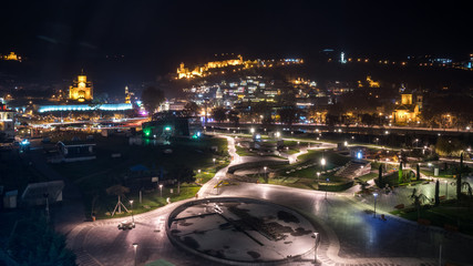 Fototapeta na wymiar Night view of old Tbilisi. Narikala Fortress and other landmarks of the city.